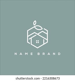 A line art icon logo of a home and mountain in a hexagon of leaves