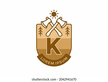 Line art illustration of camping ax with K initial letter design