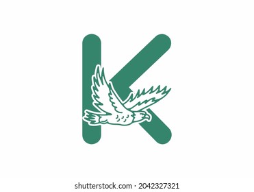 Line art illustration of flying eagle with K initial letter design