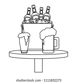 line beer bottles inside bucket and liquor glass