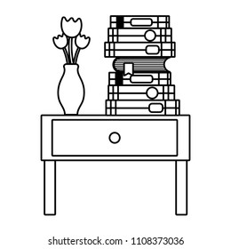 line books and flowers vase on the table