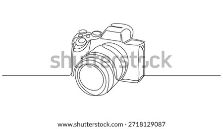 A line drawing of a digital camera on a white background,camera continuous one line art drawing,