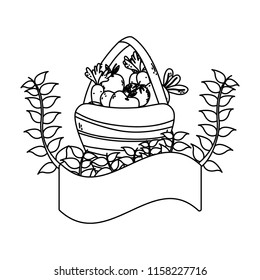 line fruits and vegetables inside hamper and plant branches