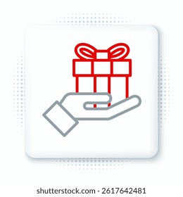 Line Gift box in hand icon isolated on white background. Merry Christmas and Happy New Year. Colorful outline concept. Vector