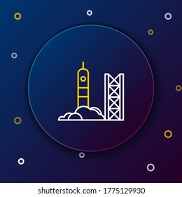Line Rocket launch from the spaceport icon isolated on blue background. Launch rocket in space. Colorful outline concept. Vector