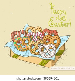 Linear colored sketch of the easter pretzels in the gift wrap with green text Happy Easter. Hand drawn vintage vector illustration with lettering happy easter on the textured beige paper background.
