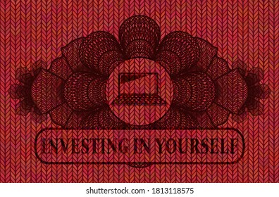 Linear currency decoration laptop computer icon and Investing in yourself text Red color woolen fabric realistic badge. Cloth exquisite background. Vector illustration. 