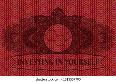 Linear decoration molecule icon and Investing in yourself text Red woolen fabric realistic emblem. Cloth fancy background. Artistic illustration. 