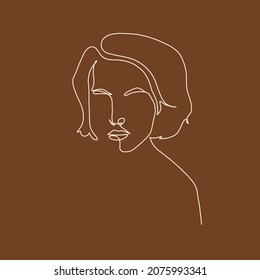 Linear drawing of a woman's face. Continuous one line style. Hand drawn art. 