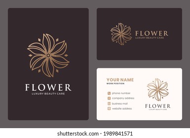 linear flower logo design with golden color.