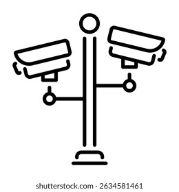 A linear icon depicting street camera in cityscape