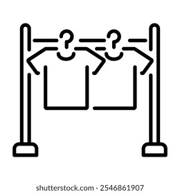 Um ícone linear de roupas penduradas em um rack