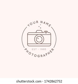 Linear logo of the photographer in a trending minimal linear style. Round emblem the camera. Vector Abstract symbol for a photo Studio.