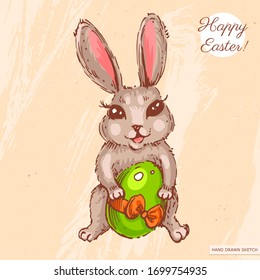 Linear sketch of the cute easter baby rabbit with egg, text Happy Easter. Hand drawn vintage vector illustration with easter bunny and egg on the textured beige paper background.