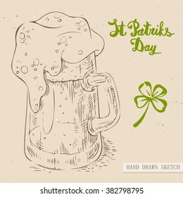 Linear sketch of the irish glass of beer with four-leaf clover and text congratulation St. Patrick's Day. Vector vintage hand drawn illustration on the textured paper background.