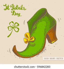 Linear sketch of the leprechaun shoe with clover and text congratulation St. Patrick's Day. Vector vintage hand drawn illustration on the textured paper background.