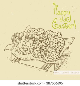 Linear sketch of the tasty easter pretzels in the gift wrap with green text Happy Easter. Hand drawn vintage vector illustration with lettering happy easter on the textured beige paper background.