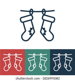 Linear vector icon with christmas socks on rope