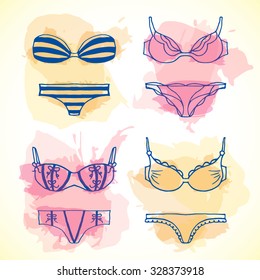 Lingerie hand drawn set. Vector underwear design. Outline illustration with splashes on background. Bras and panties doodle style. Fashion feminine wallpaper excellent for packing.