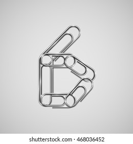 Linked paperclips forming number 6, vector