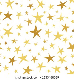 Linocut Gold and Yellow Stars on White Background Vector Seamless Pattern. Christmas Hand Printed Background. Starry Winter Holiday Print.