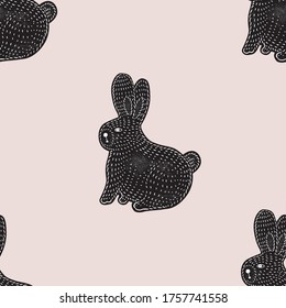 Linocut style friendly rabbit vector illustration. Ready to use seamless graphic pattern.