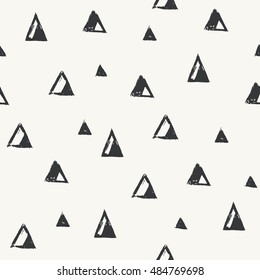 Linocut triangles seamless pattern