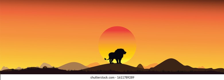 Lion African.Safari theme.Amazing sunset and sunrise.Panorama silhouette tree in africa with sunset.Dark tree on open field dramatic sunrise.