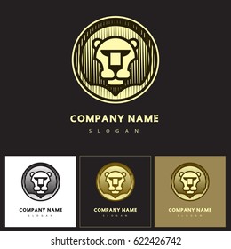 Lion head - abstract vector icon, template for logo design. Graphic illustration of golden image in a circle. Yellow color on black background.