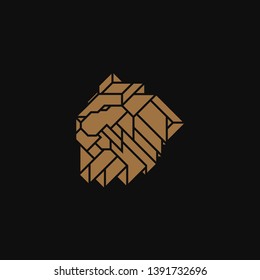 Lion Head Logo Design Template. Gold emblem vector isolated on black background