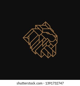 Lion Head Logo Design Template. Gold emblem vector isolated on black background