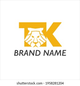 lion head with mane in full face, negative space in letters TK