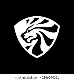 Diseño del logotipo de la cabeza de león y el emblema del escudo. Ilustración vectorial de la cabeza de león en fondo oscuro