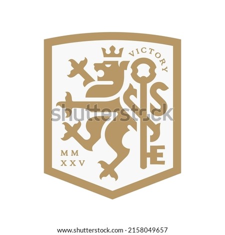 Lion and key crest heraldry logo. Royal heraldic animal coat of arms crown icon. Luxury vintage style insignia shield emblem. Premium classic brand symbol design. Vector illustration.