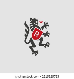 Lion with shield heraldic emblem. Logo design template. Vector illustration.