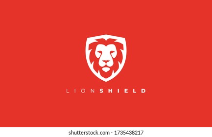 lion shield logo . lion head in the shield logo isolated on red background . creative vector illustration eps10