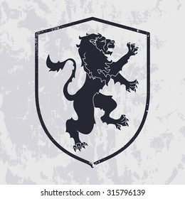 Lion in shield on grunge background - heraldic style