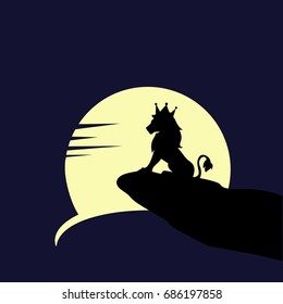 the lion is sitting on a rock and looking at the moon 