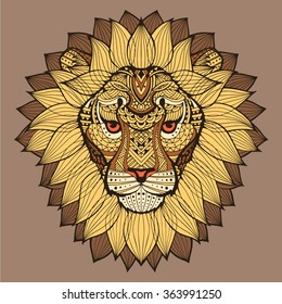 Lions Head. Patterned lion's head in the style of ethnic tribal ornament. Yellow brown color with a black stroke. Vector.