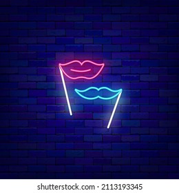 Lips and mustache on a stick neon icon. Masquerade accessory. Diverse photo booth props. Glowing effect banner. Holiday celebration design on brick wall. Editable stroke. Vector stock illustration