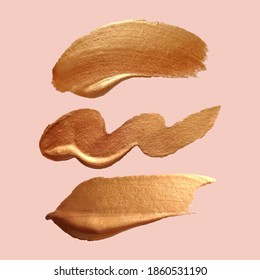 Liquid gold texture.Vector gold paint smear stroke stain set. Abstract metallic texture. Make up swatches. Acrylic color smear