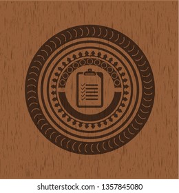 list icon inside realistic wooden emblem