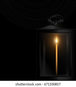 lit candle with dark background