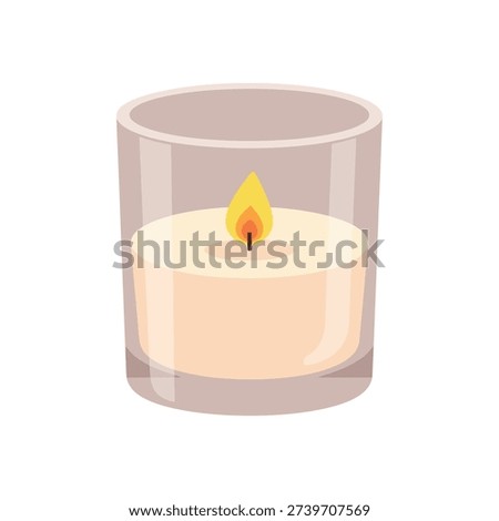 A lit candle in a glass container, emitting a warm glow.