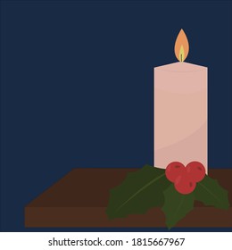lit candle with mistletoe on a table illuminates