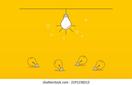 Lit light bulb standing out against unlit bulbs. Concept of Inspiration, new and innovative ideas.