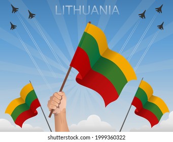 Lithuanian flags fluttering under the blue sky