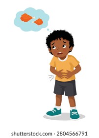 Little African boy feeling hungry thinking of eating fried chicken 