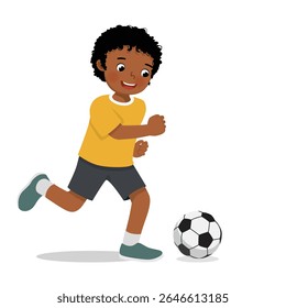 Menino africano jogando futebol pronto para chutar a bola