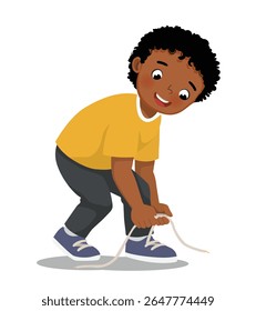 Menino africano amarrando os cadarços